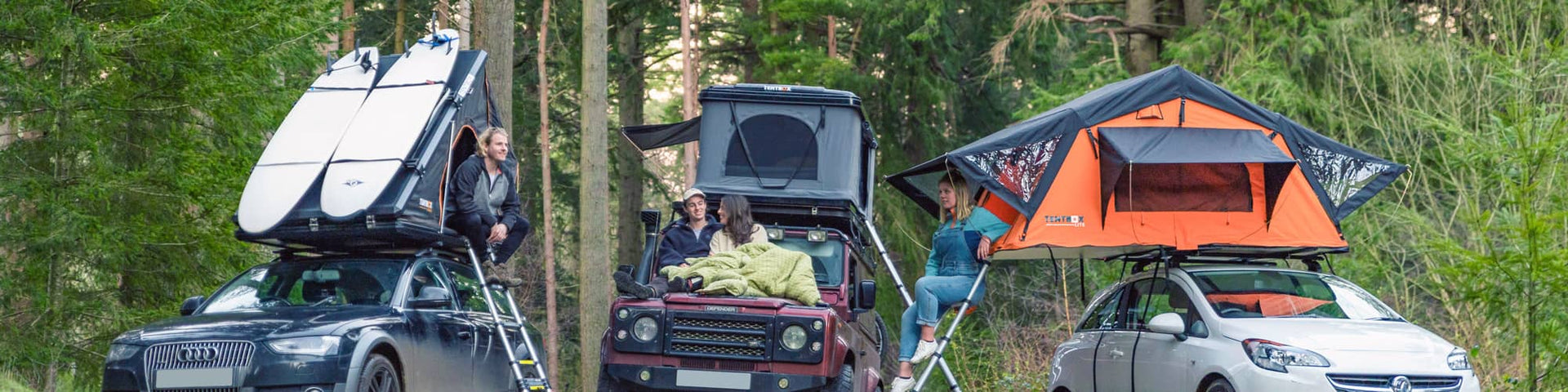 Three TentBox roof tents at a campsite in the New Forest
