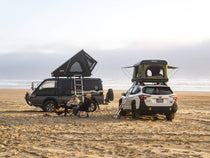 Rooftop tent camp out at the beach with the TentBox Cargo 2.0 in Midnight Grey and the TentBox Classic 2.0 in Forest Green