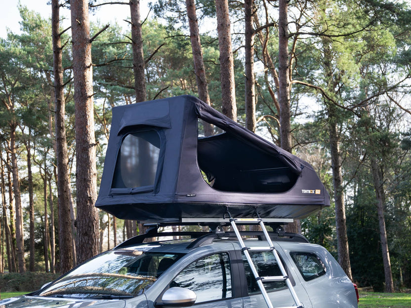 TentBox GO on a car in the forest