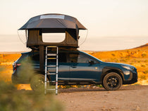 Side view of the TentBox Lite XL, installed on a Subaru Forester in the Utah desert